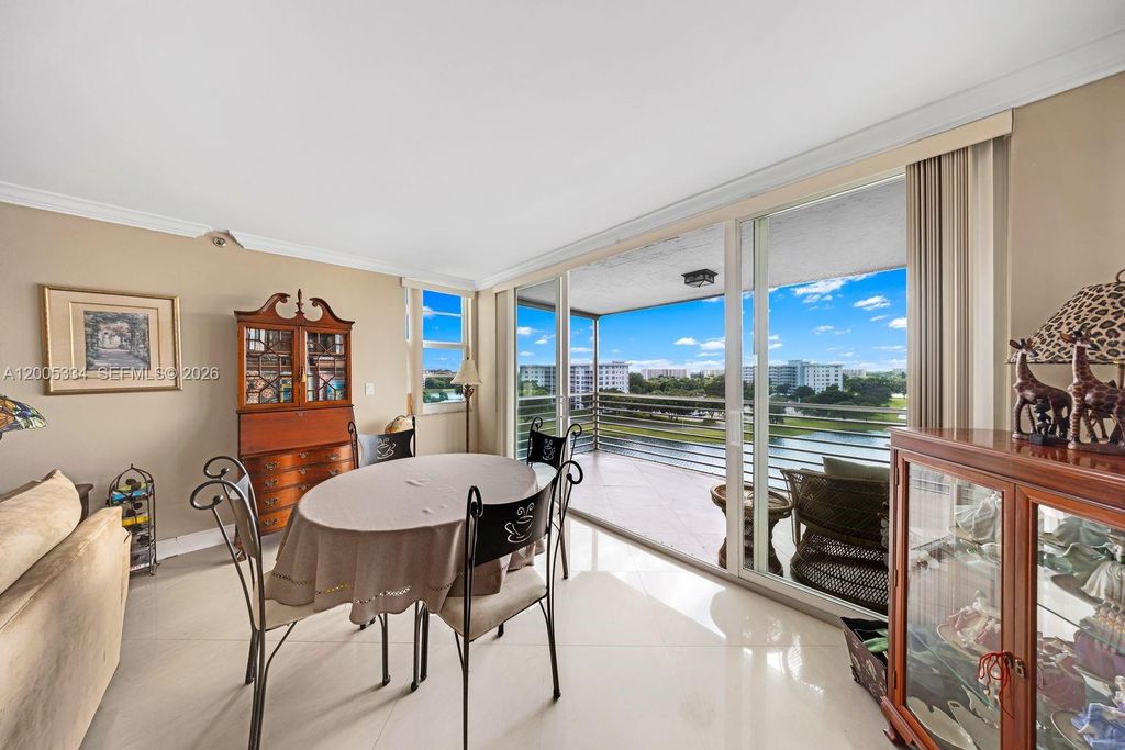 Photo of 3095 N Course Dr #811, Pompano Beach, FL 33069 (MLS # A12005334)