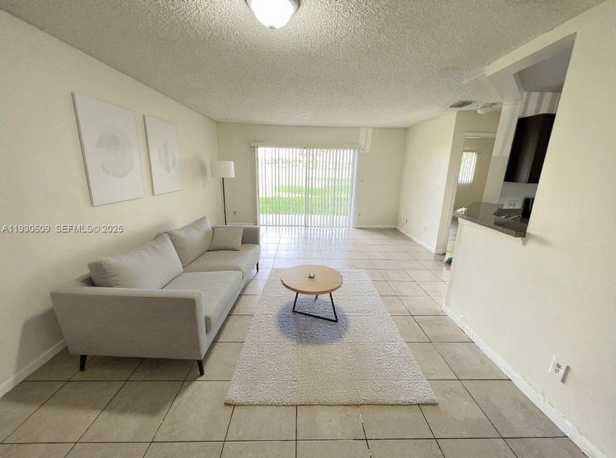 This beautifully maintained 2-bedroom, 2-bath condo offers a stunning lake view and is just 5 miles from the beach, with easy access to the Turnpike and I-95. Featuring vaulted ceilings, an in-unit washer/dryer, and a pet-friendly, gated community, this condo is perfect for both homeowners and investors. Enjoy great amenities including a pool, gym, spa, and a scenic walking trail around the lake. With ample parking and easy approval, this condo offers a prime location for convenient living and renting. Don’t miss out on this fantastic opportunity!----------special assessment of $680.67 monthly ending August 2026----------UNIT RENTED TILL 10/31/2026, PAYS $2,000.00 PER MONTH - 24hs previous notice for tenant to open the door to show