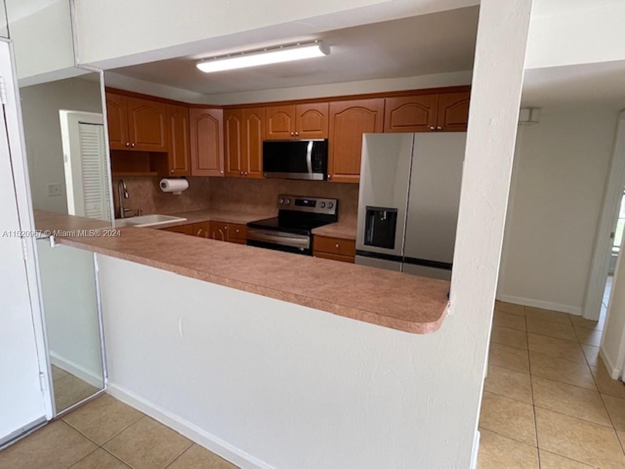 KENDALL ACRES CONDO BLDG - Residential Lease