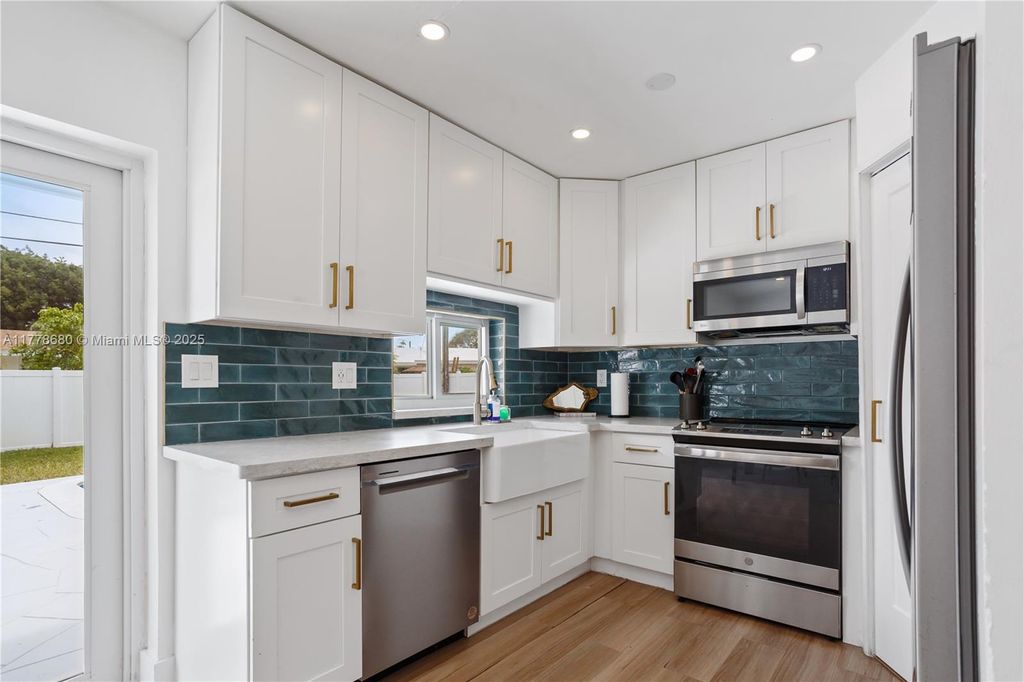 Photo of 3710 NW 6th Ave, Deerfield Beach, FL 33064 (MLS # A11778680)