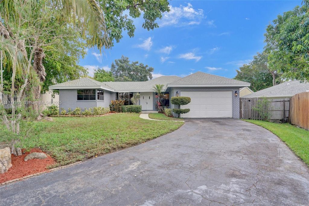 Photo of 4459 NW 113th Ln, Coral Springs, FL 33065 (MLS # A11817935)