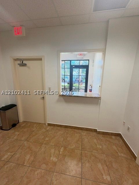 7501 Wiles Road 102-A