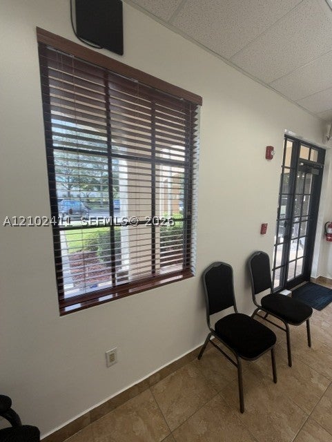 7501 Wiles Road 102-A