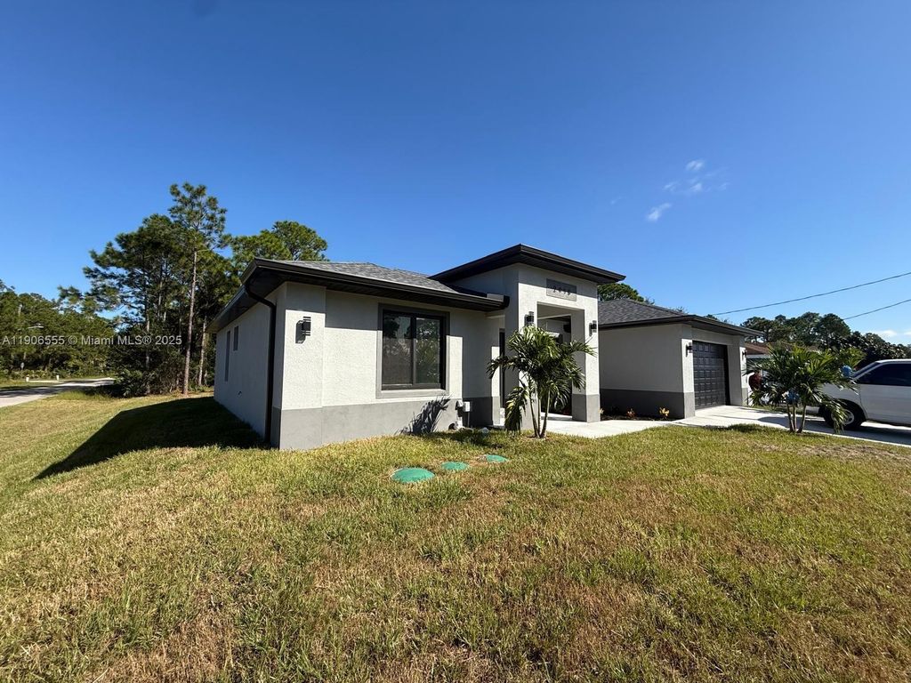 Photo of 2918 48th ST W, Lehigh Acres, FL 33971 (MLS # A11906555)