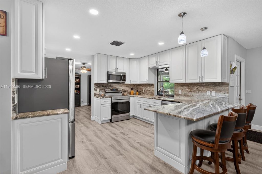 Photo of 13174 N 174th Ct N, Jupiter, FL 33478 (MLS # A11969586)