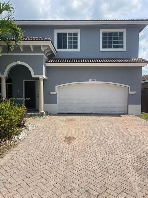 Single Family Residence in Miami FL 13006 143rd Ter.jpg