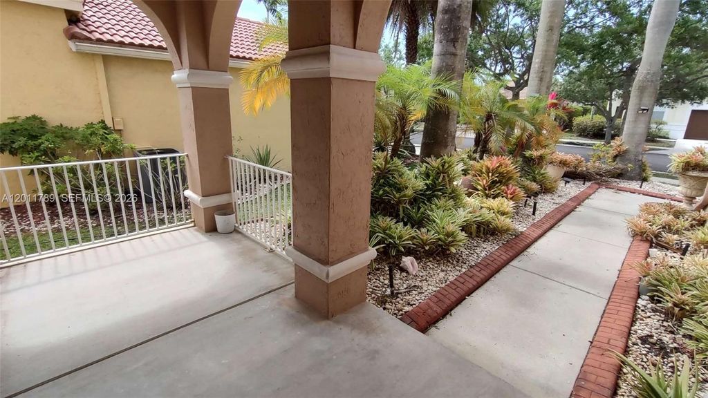 Photo of 624 Bald Cypress Rd #624, Weston, FL 33327 (MLS # A12011789)
