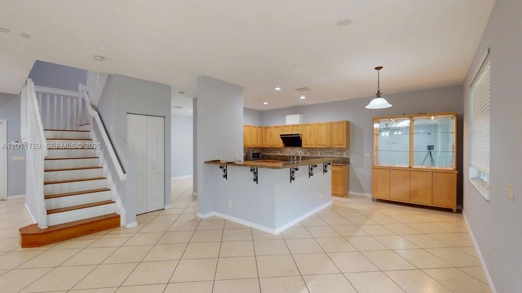 Photo of 624 Bald Cypress Rd #624, Weston, FL 33327 (MLS # A12011789)