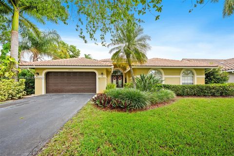 Photo of 10420 NW 49th Pl, Coral Springs, FL 33076 (MLS # A12015413)
