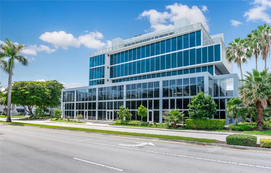 Unit 304 is located in a distinctive boutique commercial building in the heart of Doral, FL. This modern property features a low energy consumption design and is prewired for high-speed internet and telephone services. The building offers low association fees and showcases 11-foot impact-resistant, insulated, and tinted glass walls, delivering a sleek and contemporary aesthetic. Common areas are well illuminated with LED lighting, enhancing the sense of space and functionality. Each floor includes modern, spacious, ADA-compliant restrooms for both men and women. This is an excellent opportunity to establish your business in a prime and growing commercial location. Easy to show