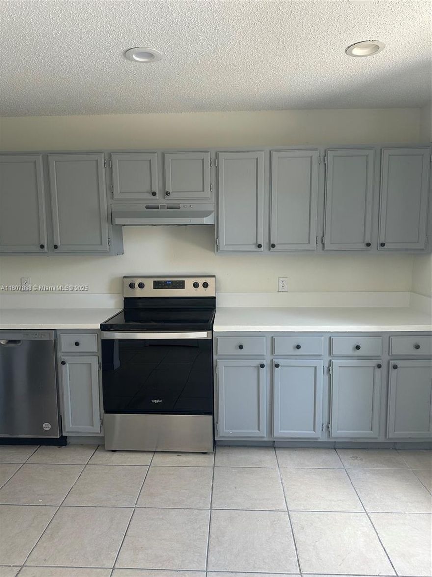 This two-story townhouse in the vibrant heart of West Palm Beach, With tile floors on first floor, well equipped kitchen featuring stainless steel appliances contemporary Cabinetry, one and a half bath for guests and small backyard or patio, Upstairs, you will find two bedrooms and bath. This townhouse combines  privacy and comfort.