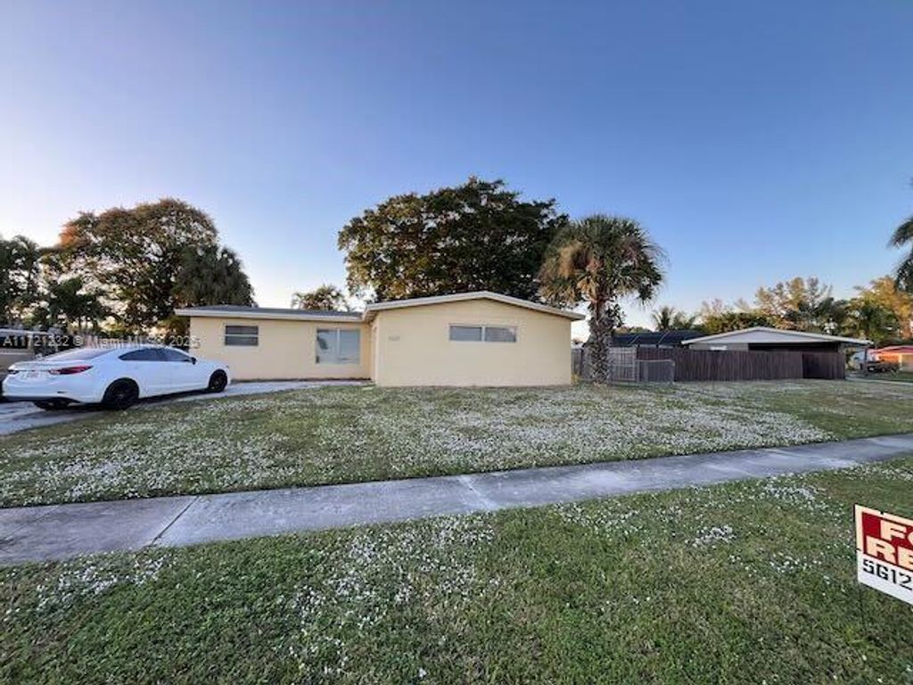 Photo of 12217 Hillman Dr #1, Palm Beach Gardens, FL 33410 (MLS # A11721232)