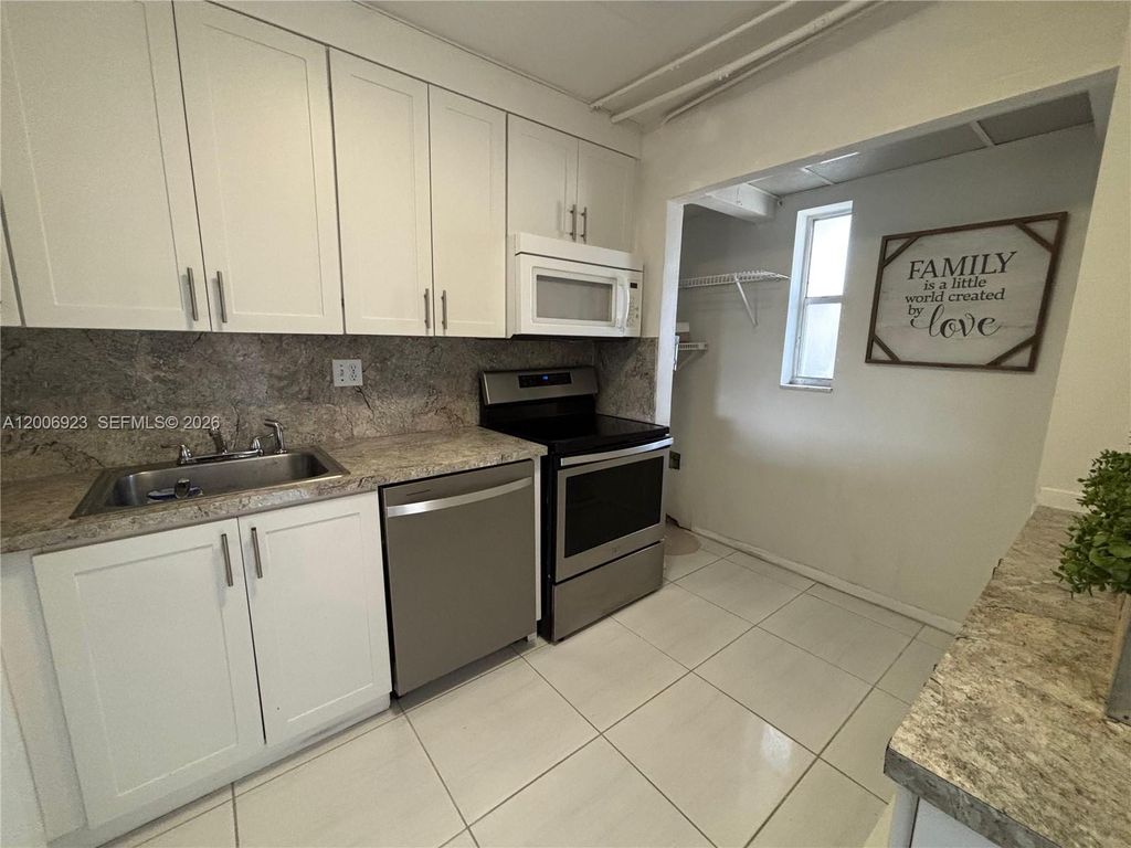 Photo of 8060 Fairview Dr #101, Tamarac, FL 33321 (MLS # A12006923)