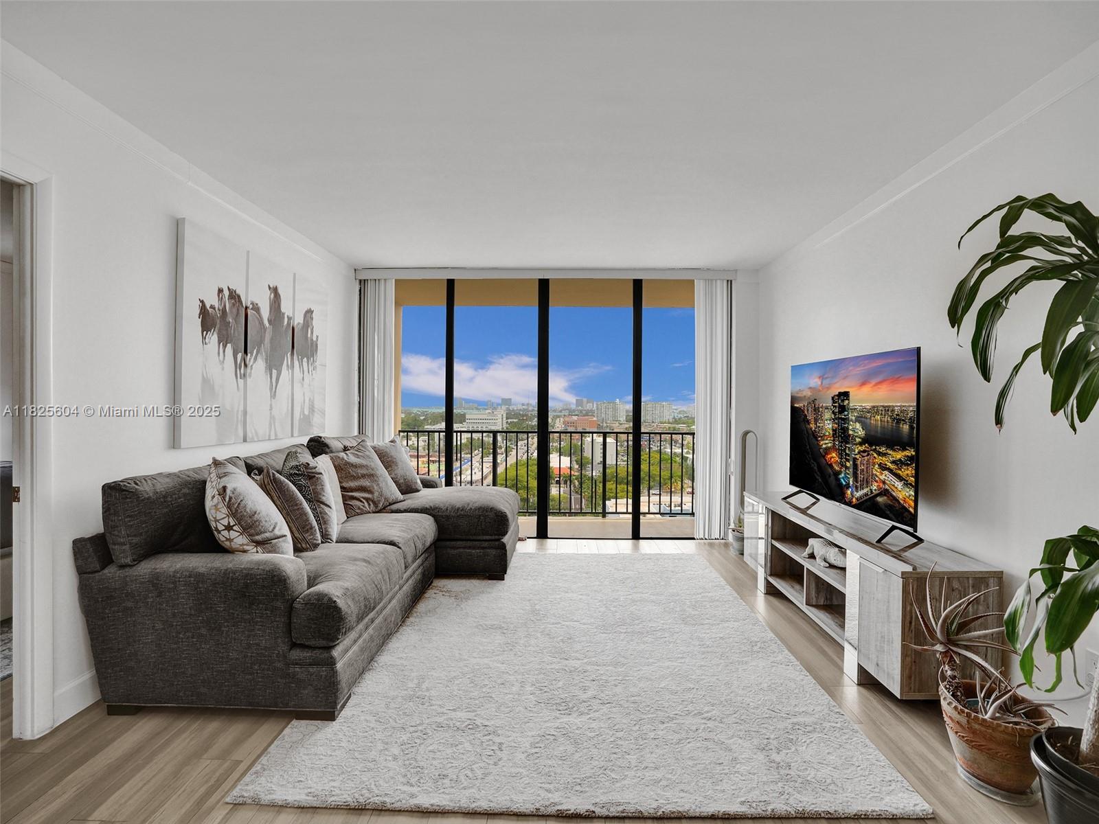 The nicest unit in the entire building! This spacious 2/2 split unit is on the penthouse, located in a gated community. COMPLETELY RENOVATED with high-grade material. Balcony is facing East(you don't want to be facing West in this building or under 10th floor!)w/views of Biscayne Bay & ocean. White Quartz countertops in kitchen+bathrooms. Large master suite w/luxurious bathroom & large walk-in closet. Second Bedroom w/ luxurious bathroom and additional private guest entry. Italian Porcelain Floors & crown molding throughout. Popcorn ceiling removed. TWO parking spots+enough parking for guests(rare to find in N.Miami). Pool, gym, BBQ area, dog park(pet friendly), sports court+security at night. Walking distance to Whole Foods, restaurants, etc. INVESTORS, RENT RIGHT AWAY!! Conventional OK.