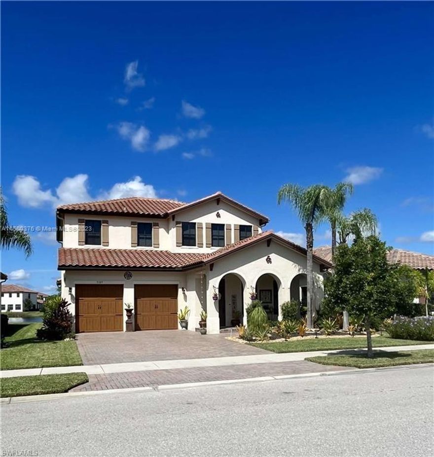 **ATTN BUYERS ** $5,000 CREDIT AT CLOSING WITH AN APPROVED OFFER**Spectacular Caples model is beautifully upgraded & sits on a lakefront lot! With almost 2,900 sqft living space this 3 BR/3 full BA + loft + den (could be used as 4th bedroom) upgraded 42” cabinets, custom built lighted bar, granite counters, 20” tile, feature wall w/ shiplap & elect. fireplace, tv, french doors & LED lighting throughout. Addtl features include impact windows/doors, 2 a/c units, wood staircase & landing. Upstairs master bedroom w/ tray ceiling & an extra large walk in closet w/ custom closet shelving. Master bath includes dual vanities w/ walk-in shower & soaking tub. Bedrooms 2 & 3, Jack & Jill bathroom, laundry room & loft area. Spacious backyard features screened lanai with picture window & pavered deck.
