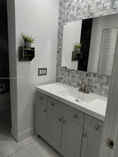 Tiny photo for 255 NE 41st Ct, Deerfield Beach, FL 33064 (MLS # A12027762)