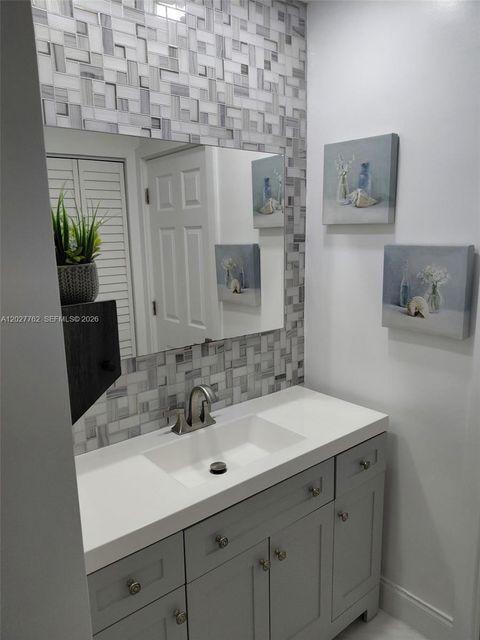 Tiny photo for 255 NE 41st Ct, Deerfield Beach, FL 33064 (MLS # A12027762)