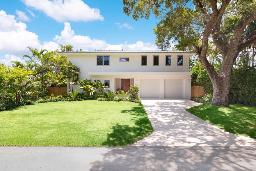 Newly built luxury home, combines elegance and advanced technology. Over 4360 sq ft of living area and 10 ft ceilings throughout. A stunning and sophisticated main living area has floor to ceiling efficient low-e impact windows. A high-end kitchen with Italkraft cabinets and Wolf Sub-zero appliances, complimented by a custom wet bar. The functional layout offers a bedroom on the lower level suitable for various uses. Primary bedroom with sitting area, walk in closet and marble adorned primary bath. Take your entertaining and family fun outdoors, enjoy beautiful mature landscaping by CLAD, pool and large covered terrace. State of the art amenities such as Lutron RadioRA3 lighting system, Cat-6 wiring, are just a few of the many features. The pinnacle of comfort and luxury in Miami Shores.