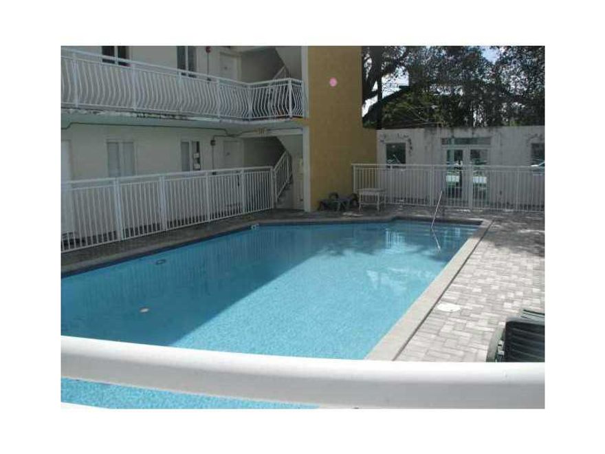 Wonderful condo in the heart of Coconut grove. This first floor unit features, 1 bedroom/1 bathroom, spacious living areas, SS appliances, European style cabinetry, granite look inlaid myka, washer & dryer inside and 1 assigned parking space. The building  is walking distance to the center of the Grove, restaurants, local parks, and plenty of entertainment areas. Easy access to public transportation & schools.