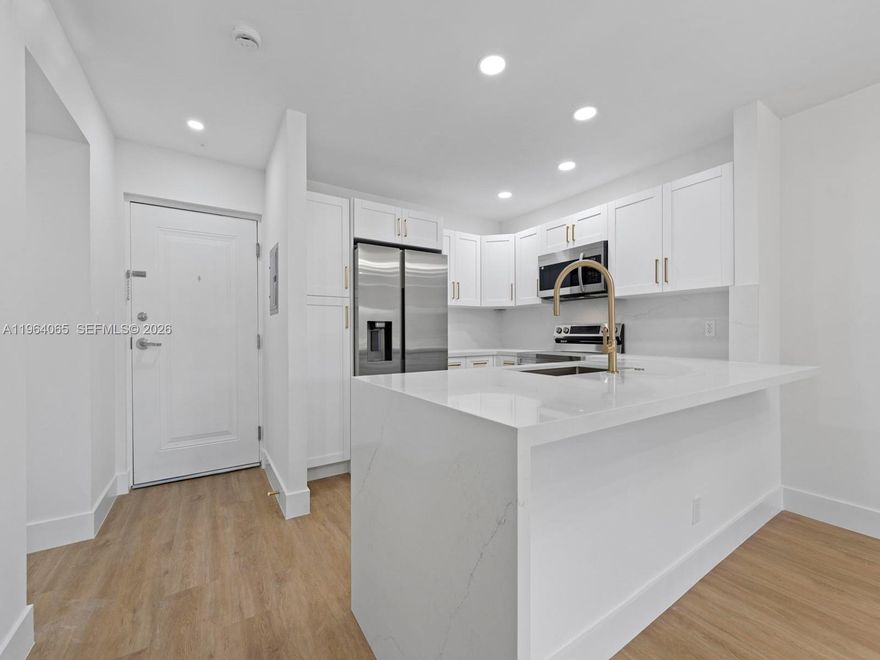 Beautifully renovated one-bedroom apartment located in the vibrant heart of the Dadeland area. This stylish apartment features all brand-new appliances, modern flooring, and an updated bathroom. Designed with an open-concept layout, the unit boasts impact-resistant windows and doors, along with a spacious quartz island that anchors the contemporary kitchen. Enjoy a wealth of community amenities, including multiple swimming pools, a well-equipped fitness center, tennis and basketball courts, and a welcoming clubhouse. Conveniently situated near major highways, premier shopping destinations, and a variety of dining options.