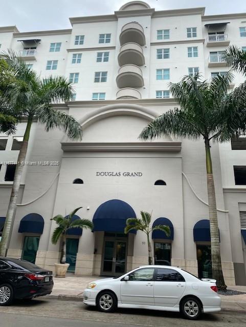 1 bedroom, 1 bath condo in the Douglas Grand now available. Best location on the top floor with view of the fabulous Coral Gables skyline as well as the pool. Kitchen with pass thru to spacious dining/living area. Cozy balcony for your morning coffee or evening happy hour. Bedroom has large walk in closet. Washer/dryer included. Laminate flooring throughout internet and basic cable included in the condo fee. Sparkling swimming pool for your enjoyment and also an exercise room. Condo can be rented first year of ownership. Secure entrance and concierge in lobby. Unit needs some TLC, but well worth a look. AC compressor new 2023, inside unit also recent. Pets ok up to 50 lbs. Great location. New roof, owner paid assessment in full.