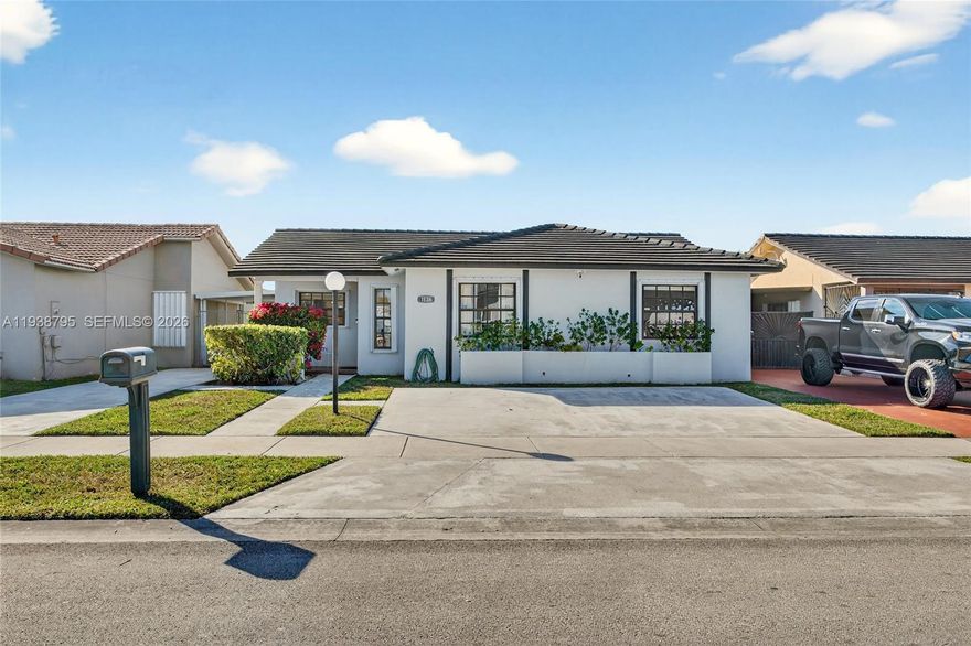 Situated in the desirable Alba Gardens community, this well-kept single-family home offers comfort, convenience, and flexibility with no HOA. The property features a spacious 3-bedroom, 2-bath layout, complemented by a tile roof replaced in 2021 and accordion shutters throughout for added peace of mind. The home includes a roofed terrace, ideal for outdoor entertaining, and a generously sized backyard with room to relax or personalize. Conveniently located minutes from Florida International University and major highways, this residence provides easy access to shopping, dining, and commuting routes while maintaining a quiet neighborhood feel.