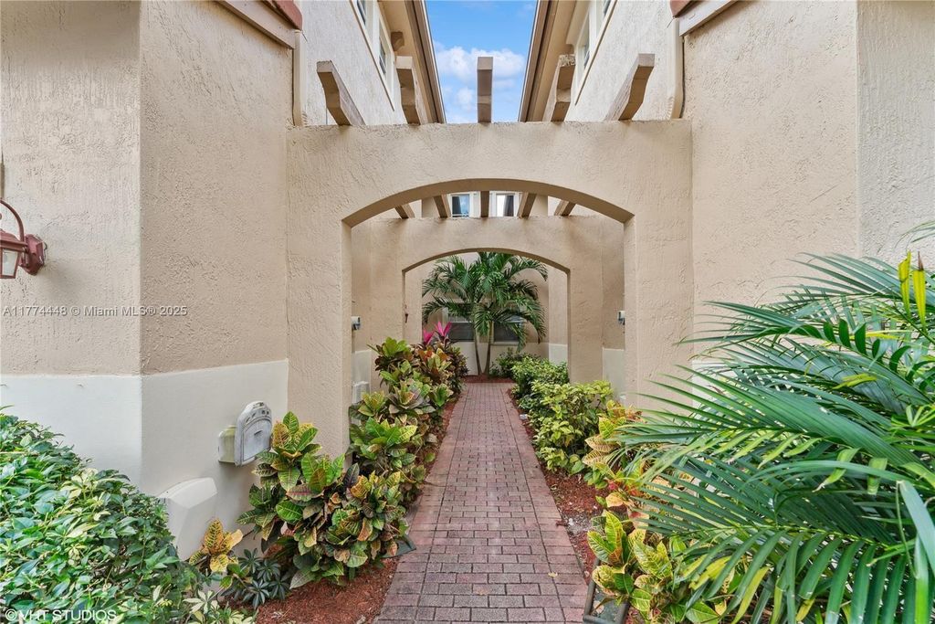 Photo of 5737 NW 119th Dr #5737, Coral Springs, FL 33076 (MLS # A11774448)
