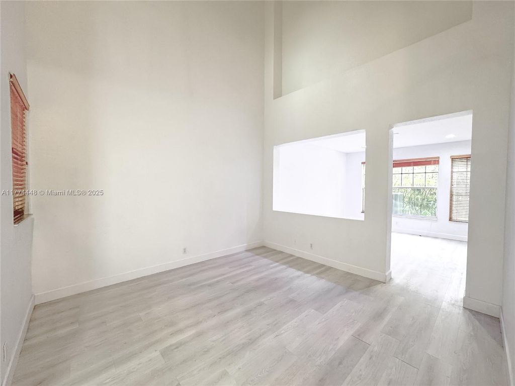 Photo of 5737 NW 119th Dr #5737, Coral Springs, FL 33076 (MLS # A11774448)