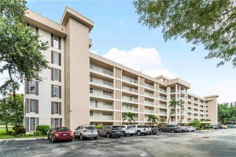 Photo of 2651 S Course Dr #602, Pompano Beach, FL 33069 (MLS # A11851358)
