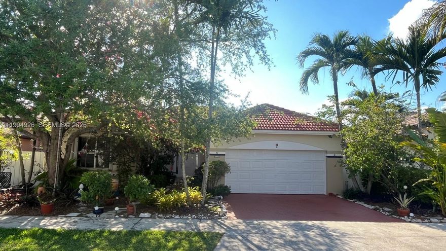 Beautiful and spacious one-story single-family home located in a highly desirable, quiet Miami neighborhood with no HOA. Featuring 3 bedrooms and 3 full bathrooms (originally 2.5, with a converted shower in the former half bath). Bright and open layout with high ceilings, a large living room, formal dining room, open kitchen, and a large family room. The terrace has been enclosed, adding versatile living space ideal for an office, gym, or playroom.  The ample primary bedroom includes a walk-in closet and a spacious bathroom with dual sinks and a jacuzzi tub. Additional features include a laundry room with private entrance converted into extra flexible space (ideal for an office, nanny/housekeeper quarters), a 2-car garage with washer and dryer, Venetian blinds, and accordion hurricane shutters. Beautiful front garden and a backyard. Tile floors throughout, including patio and garage. Conveniently located near major highways including the Florida Turnpike, SR-836, and 8th Street. Close to schools, Dolphin Station Park & Ride, Dolphin Mall, Miami International Airport, Florida International University (FIU), shopping, dining, and more.  *Furniture in the office photo is digitally staged and for illustrative purposes only
