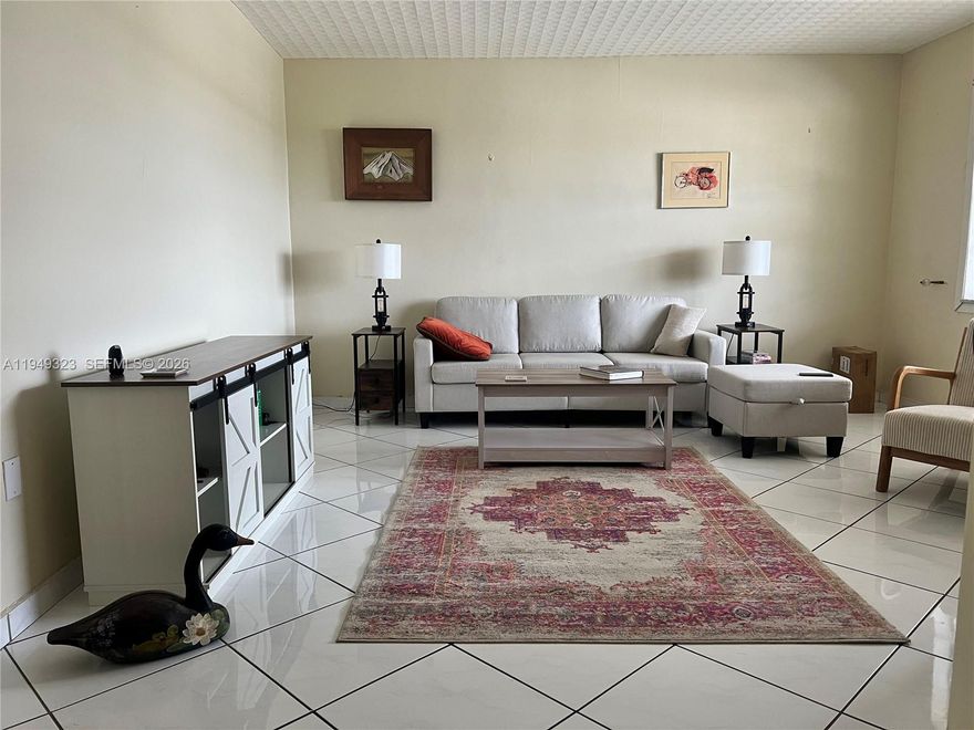 Welcome to the Mar-Len Gardens, bldg 11. This 1 bedroom & 1 bathroom is on the top floor, light & bright & waiting for the next homeowner to make it their own. Updated kitchen with white cabinets & tile floor throughout. One of the rare unit with Central air! Screened balcony with quiet views on the gardens. Hopa Verified Community with lots of activities and fun. COOP with land lease. Cash only, No Rental 1st year, then once a year for a max of 4 months, Gated community with 2 pools, clubhouse, gym & inside pickleball.. Only 3 miles to the beach Beach! Closed to the restaurants & stores! Call fast, won't last! Monthly fees are $740 including maintenance, land lease (until 2064) & taxes that you will not have to pay at the end of the year. Such a great opportunity to own a place in Miami