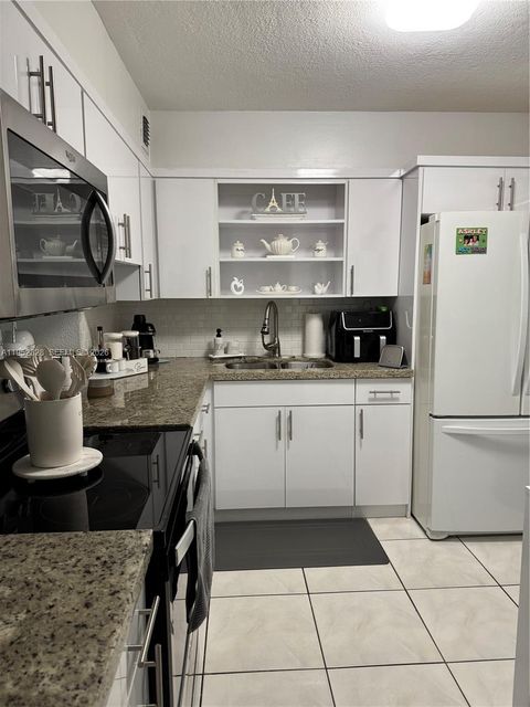 Photo of 1480 W 46th St #203, Hialeah, FL 33012 (MLS # A11952328)