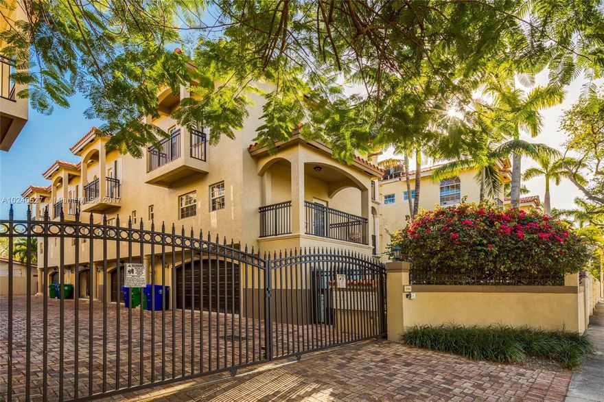 A unique opportunity to live in an exclusive, gated community in the heart of beautiful Coconut Grove. This well-maintained tri-level townhouse comes with two bedrooms, two and a half bathrooms, three exterior balconies, and a private two-car garage. It is turn-key and ready for you to move in! Updated fixtures, freshly painted exterior and new washer/dryer. Also, in close proximity to Coral Gables, Brickell and just a 20 minute ride to Miami Beach! Priced to sell. SERIOUS BUYERS ONLY