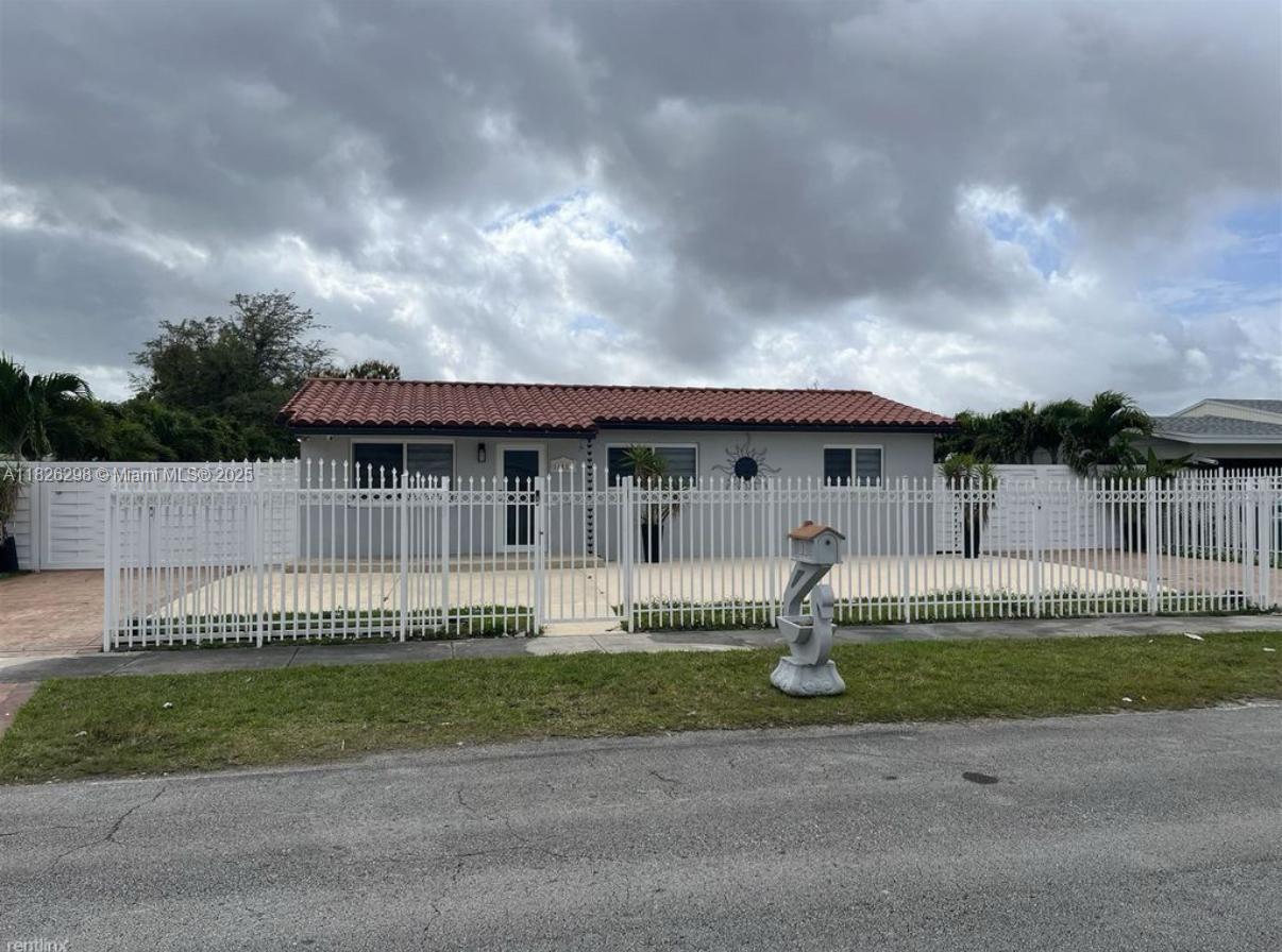 Dream Rental with Ultimate Entertaining Space! This unique 3-bedroom, 2-bathroom home is a host’s paradise featuring three kitchens—one inside and two fully-equipped outdoor kitchens, perfect for family gatherings and weekend BBQs. Enjoy the Florida lifestyle with a private fenced-in backyard, sparkling pool, and plenty of room for fun. There's also ample space to park your RV or boat securely. Whether you're looking to relax or entertain, this property has it all!