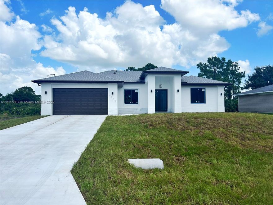 This home is truly stunning and feels grand! NEW CONSTRUCTION home ready to be your next dream home! This spacious single family property features 3 bedrooms and 3 bathrooms with double master bedrooms, open concept, 10-11 feet volume ceilings, impact windows, gray tile flooring all throughout the home, all new top of the line Samsung appliances, beautiful island with granite countertops in kitchen and same one in the bathroom vanities, double car garage with plenty of driveway space. NO HOA. This home sits on a .25 lot. HOME IS MOVE IN READY AND COMPLETED. Seller is giving $5,000 closing cost contribution to buyers.