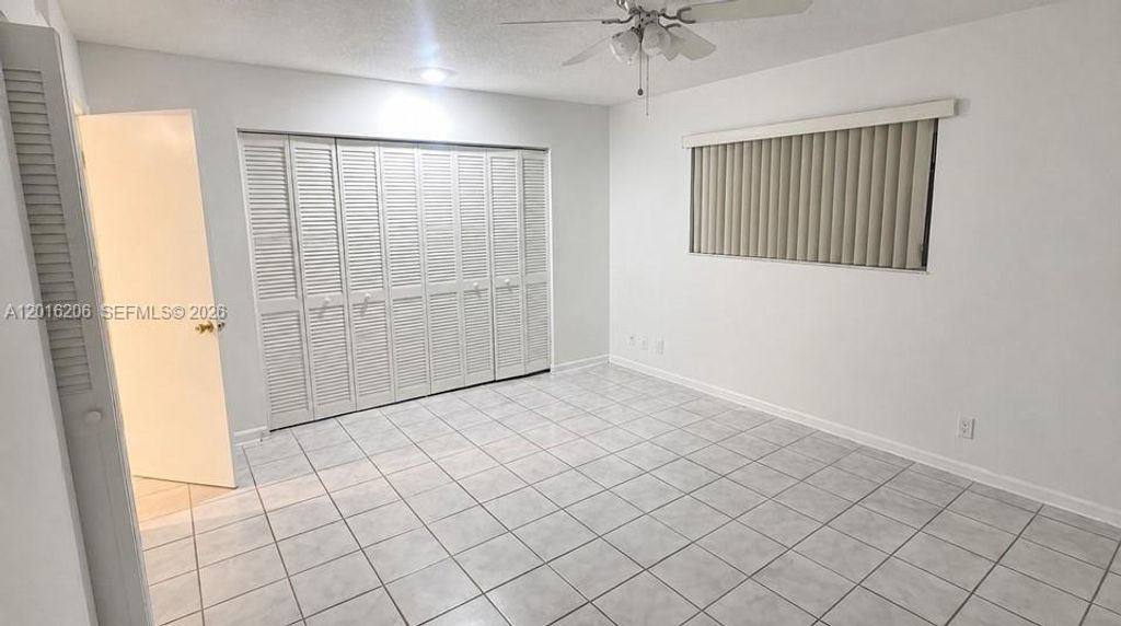 Photo of 9150 NW 38th Dr #301, Coral Springs, FL 33065 (MLS # A12016206)