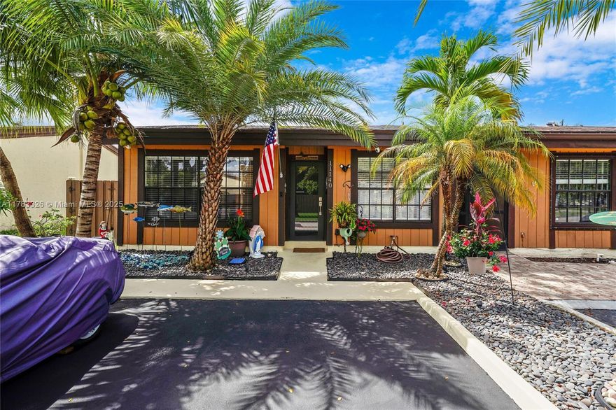 Beautifully Remodeled Corner Townhome in Cedarwoods, Pembroke Pines! This immaculate 2-bed, 2-bath home features a fully remodeled kitchen with granite countertops, stainless steel appliances, and plenty of cabinet space. Updated bathrooms and custom walk-in closets in both bedrooms. A unique spiral staircase leads to an oversized loft—perfect for an office, guest space, or storage. Enjoy a screened-in porch with peaceful lake views and direct access to a scenic 2-mile nature path. Additional features include an electric tankless water heater, large shed, avocado tree, and a corner-unit lot. Located in a pet-friendly community with low HOA fees, top-rated schools, and just minutes from Pembroke Lakes Mall, CB Smith Park, and Memorial Hospital West. Move-in ready and beautifully maintained!
