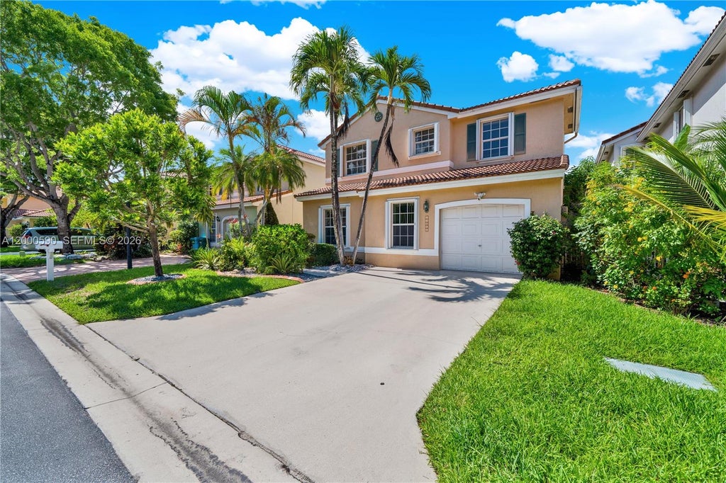 Photo of 10840 NW 46th Dr, Coral Springs, FL 33076 (MLS # A12000590)