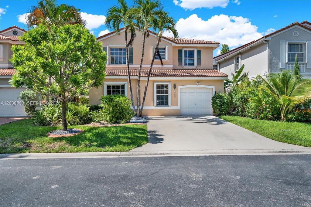 Photo of 10840 NW 46th Dr, Coral Springs, FL 33076 (MLS # A12000590)