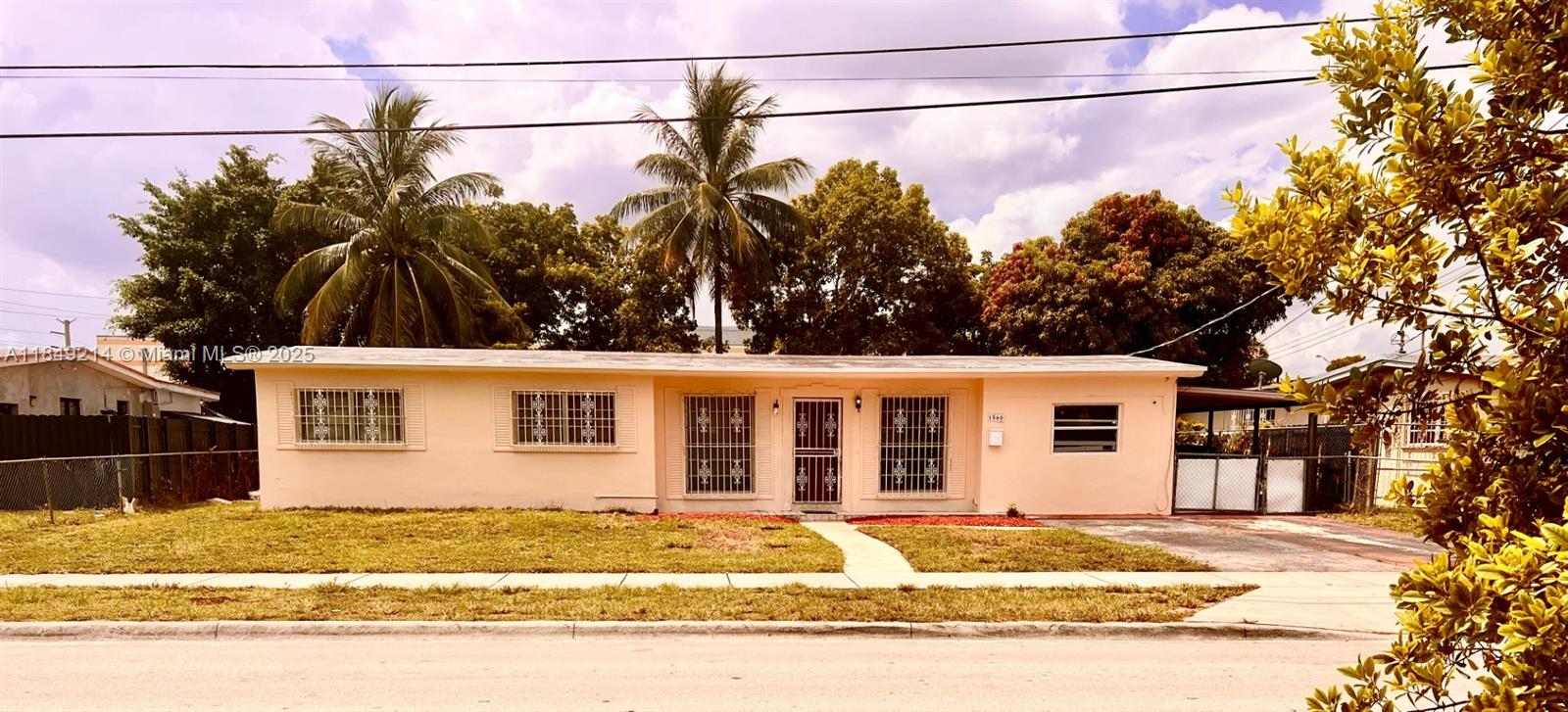 Desirable West Hialeah home with lots of potential! 4 bedrooms, 3 bathrooms with a converted garage which can be used as an efficiency. NEWER A/C! Large backyard with Lychee tree and tall Palm Trees. This house has been well kept in its original state. SOLD AS IS