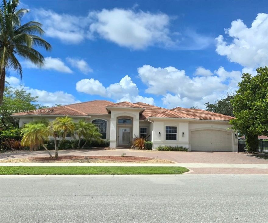 Gorgeous One-Story Home, 4 bedroom, 4 bathroom, with an additional large office (or 5th bedroom), features a split floor plan and an in-law suite with a full bath. Nestled in the exclusive Riverstone community, this home sits on a remarkable corner lot, nearly an acre in size. The spectacular lake view backyard boasts a large paved patio, pool, spa, perfect for both entertainment and relaxation. The home features high ceilings, Italian marble and hardwood floors, gourmet kitchen, glass doors, floor-to-ceiling marble in the bathrooms, high-impact windows and doors, and much more. Riverstone Community is one of the most luxurious waterfront communities in Davie, . This is a must see home!!