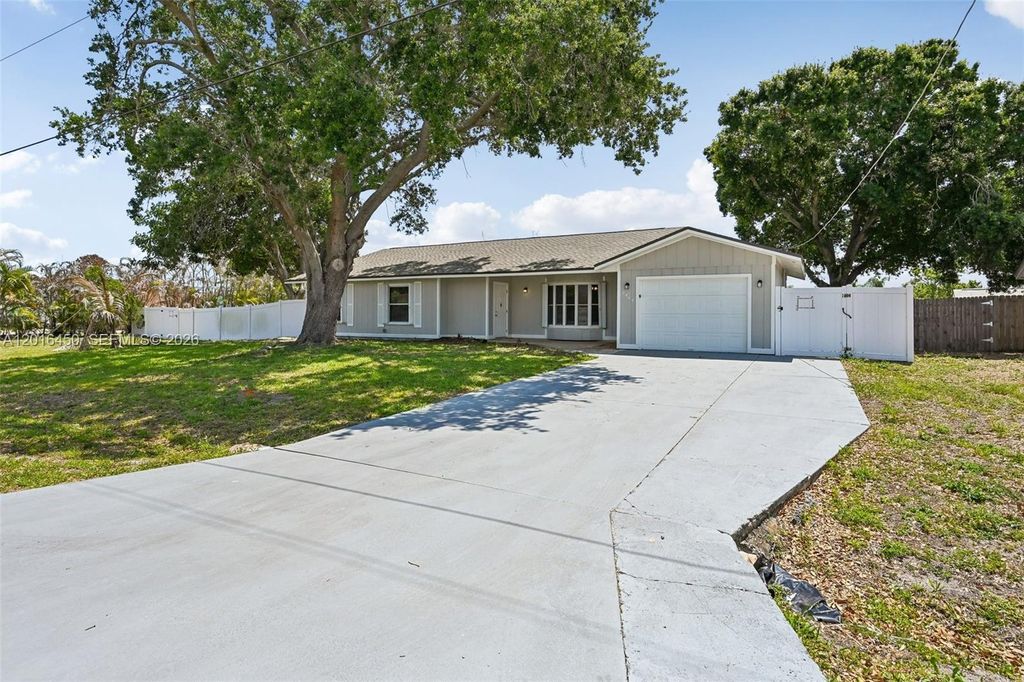 Photo of 2449 SE Aneci St, Port St Lucie, FL 34984 (MLS # A12016450)