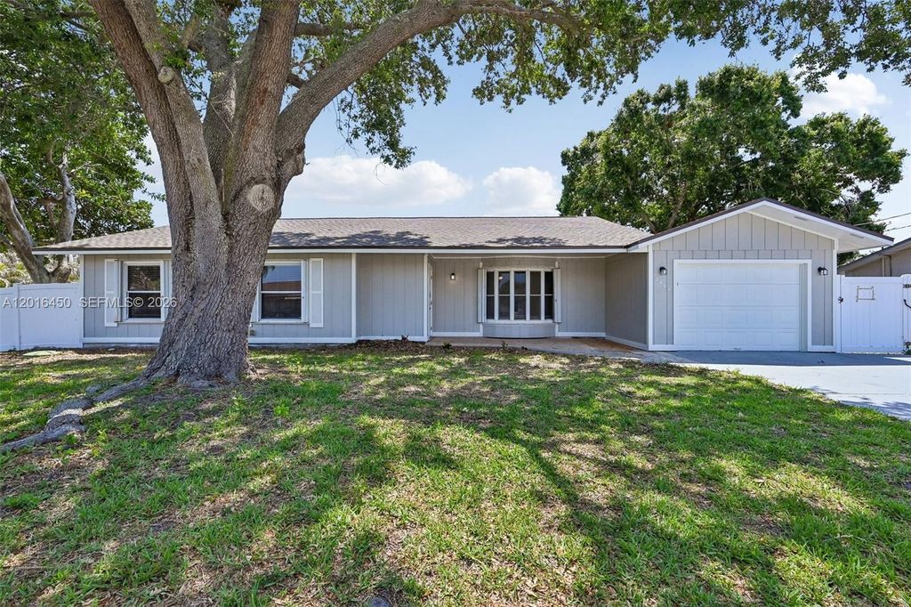 Photo of 2449 SE Aneci St, Port St Lucie, FL 34984 (MLS # A12016450)