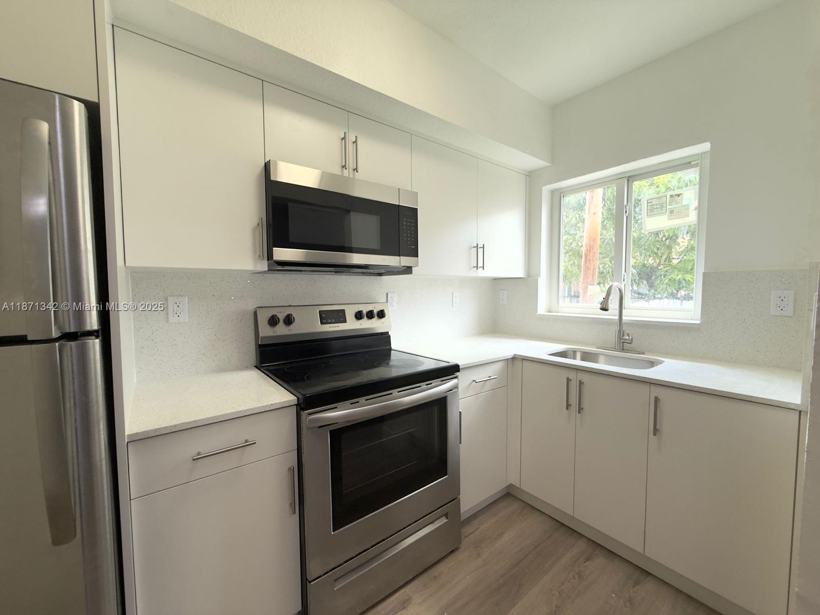 Move in with first month and one month security deposit! Beautiful and totally renovated 3 bedrooms and 2 bathrooms townhouse. Freshly painted, new kitchen, new bathrooms, new appliances, impact windows and washer/dryer inside the unit. Spacious private patio, lots of parking space and centrally located close to Wynwood, Miami Beach, Aventura and easy access to i-95. Ready to move in!