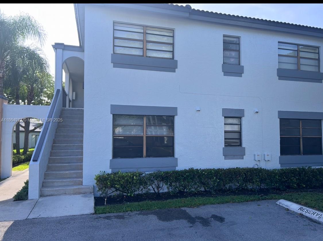 Large 2 bedroom 2 bath Condo in The Moors. Easy access to Palmetto Expressway. Centrally located blocks from Miami Lakes . Ready to live in a unit with washer and dryer. Easy to show. First Floor. Community Qualifies for Low Downpayment. LENDER CREDIT AVAILABLE for Buyer if Preferred Lender is used.