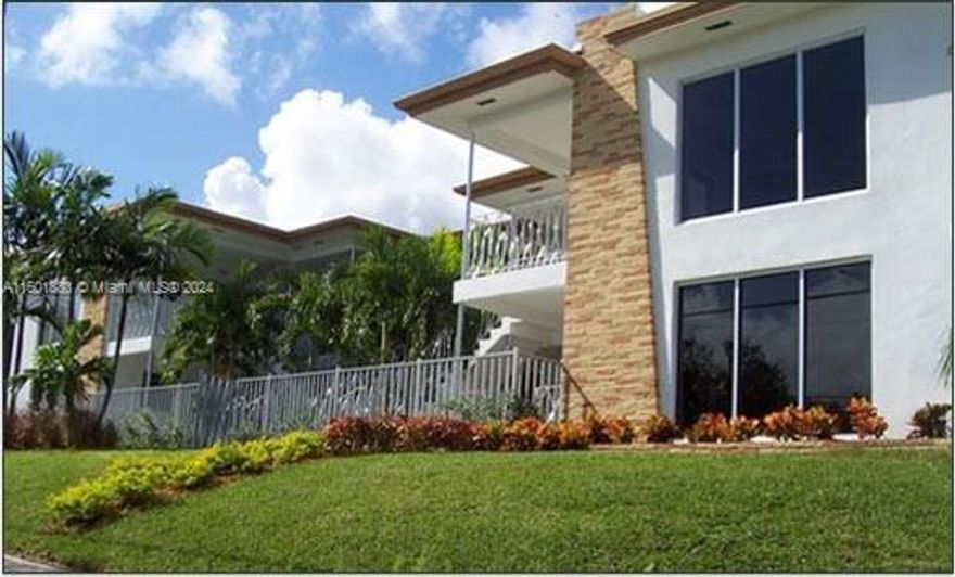 MIMO District, Upper East Side, Next To Vagabond Hotel, Near Design District/Little River/Wynwood/Midtown/Beaches; Completely Remodeled and Historically Restored, Original Wood Floors, European Cabinets, Granite Counters, Stainless Appliances, Washer & Dryer Inside Unit, Gated Access Control; Fenced, Burglar Alarm, Built In/Walk In Closets, Courtyard with Wood Deck & Pergola, Lush Landscaping, On Site Assigned Parking, Large Porch; Great Curb Appeal; Quiet Street; Building and Site Lighting