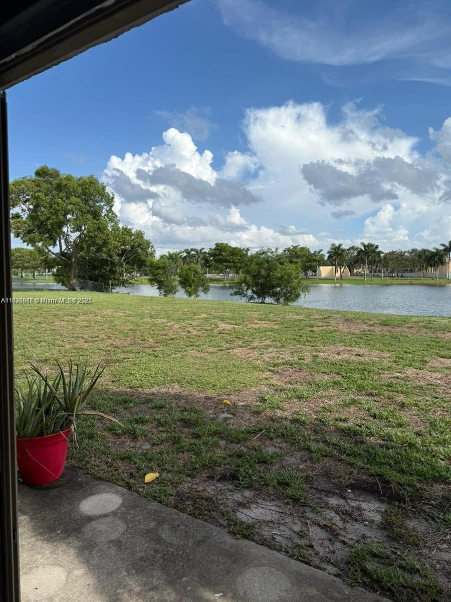 Beautiful lake view 2 bedroom and 1 bathroom apartment in the gated community of Lakeshore. Updated kitchen
with stainless steel appliances, washer and dryer inside the apartment, updated bathroom.