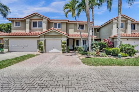 Photo of 5668 NW 127th Ter, Coral Springs, FL 33076 (MLS # A11840064)