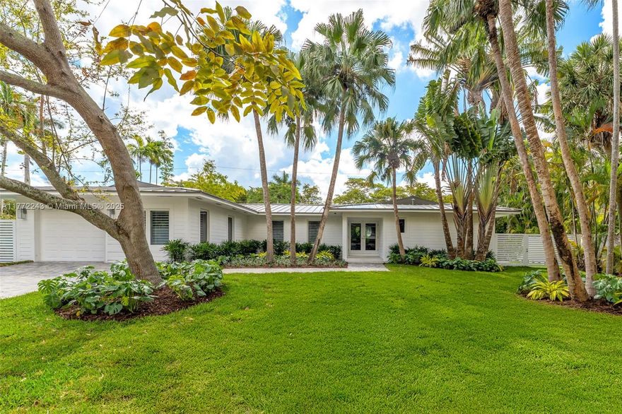 CASA SERENA: A South Grove Sanctuary. Tucked away on an iconic cul-de-sac in South Coconut Grove, Casa Serena is a picture-perfect bungalow where timeless charm meets modern elegance. This reimagined retreat nestled on a 10,400 SF Lot spans 2,550+ SF Interior and features 4 spacious bedrooms, 4 bathrooms, plus a cabana bath—designed for seamless indoor-outdoor living. Enjoy effortless entertaining with its open layout and natural light thanks to its large windows. The home faces a northern exposure benefiting the southern garden and offering full days of sun from east to west to enjoy by the pool. Offering a perfect blend of privacy and accessibility, Casa Serena is serene retreat and just a short stroll from the vibrant Grove village and top-rated schools.