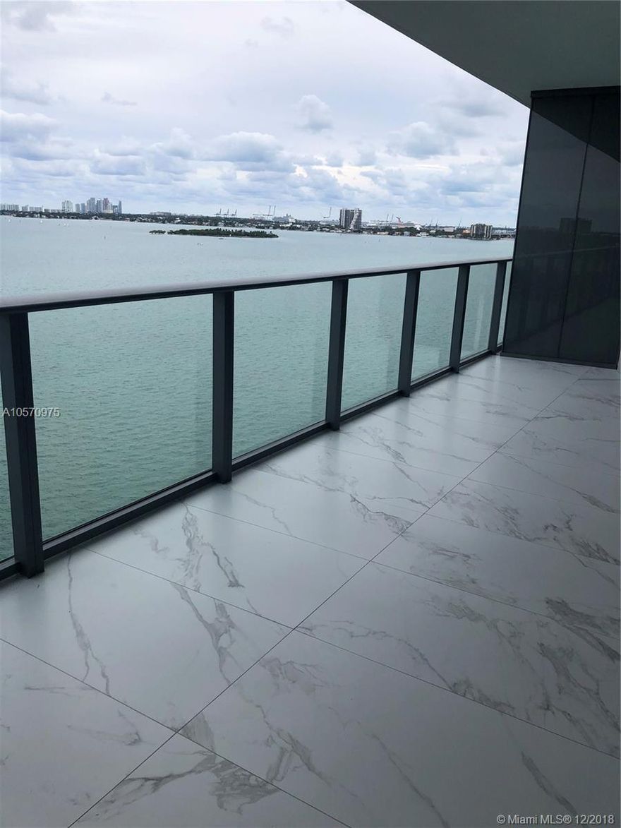 Enjoy the Miami Lifestyle in this 2/2 unit in the exclusive One Paraiso. Brand new apartment with breathtaking open view to the ocean and city. Open balcony, elegant  Italian cabinetry and SUBZERO/WOLF appliances. This 2 bedroom and 2  bathroom unit, 5 star amenities with theater, business center, kids room, wine room, 2 tennis court, 3 pools, cabanas, sauna, massage room, hydrotherapy, state of the art gym, juice bar, etc. Minutes way from Miami International Airport, I95, South Beach, Midtown and Winwood.